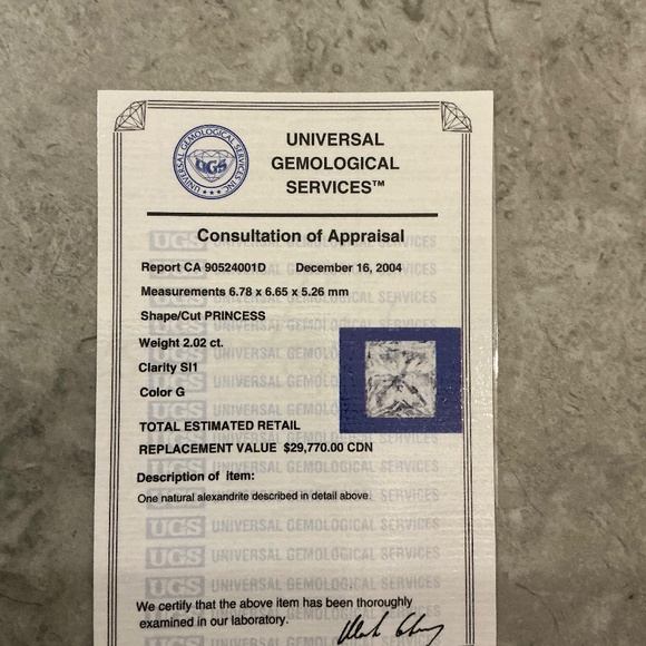 Engagement t ring comes with the original setting and the one I had it changed t - Picture 4 of 6